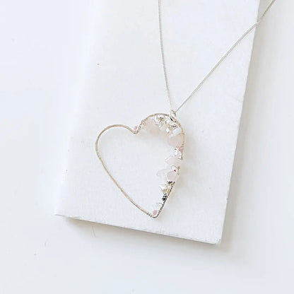 Crystal Heart Necklace in sterling silver with hand-wrapped gemstones and pearls. Elegant silver gemstone jewelry on an 18” chain.
