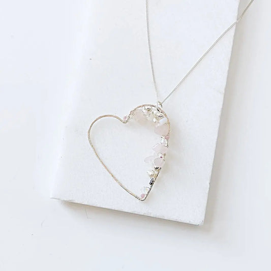 Crystal Heart Necklace in sterling silver with hand-wrapped gemstones and pearls. Elegant silver gemstone jewelry on an 18” chain.