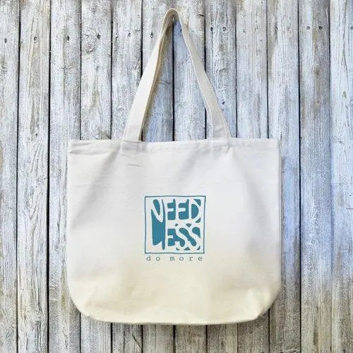 Motivational organic tote bag with 'Do More' artist design printed in blue on eco-friendly cotton, ideal for sustainable gifting.