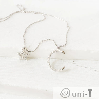 Dainty Pave Star and the Moon Necklace Janine Gerade