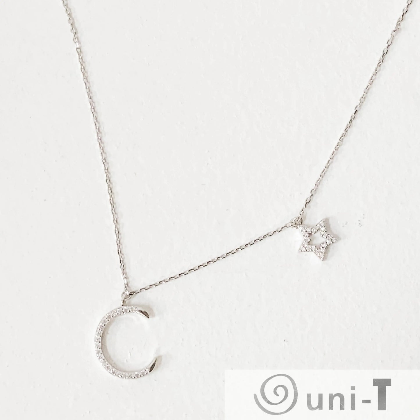 Dainty Pave Star and the Moon Necklace Janine Gerade
