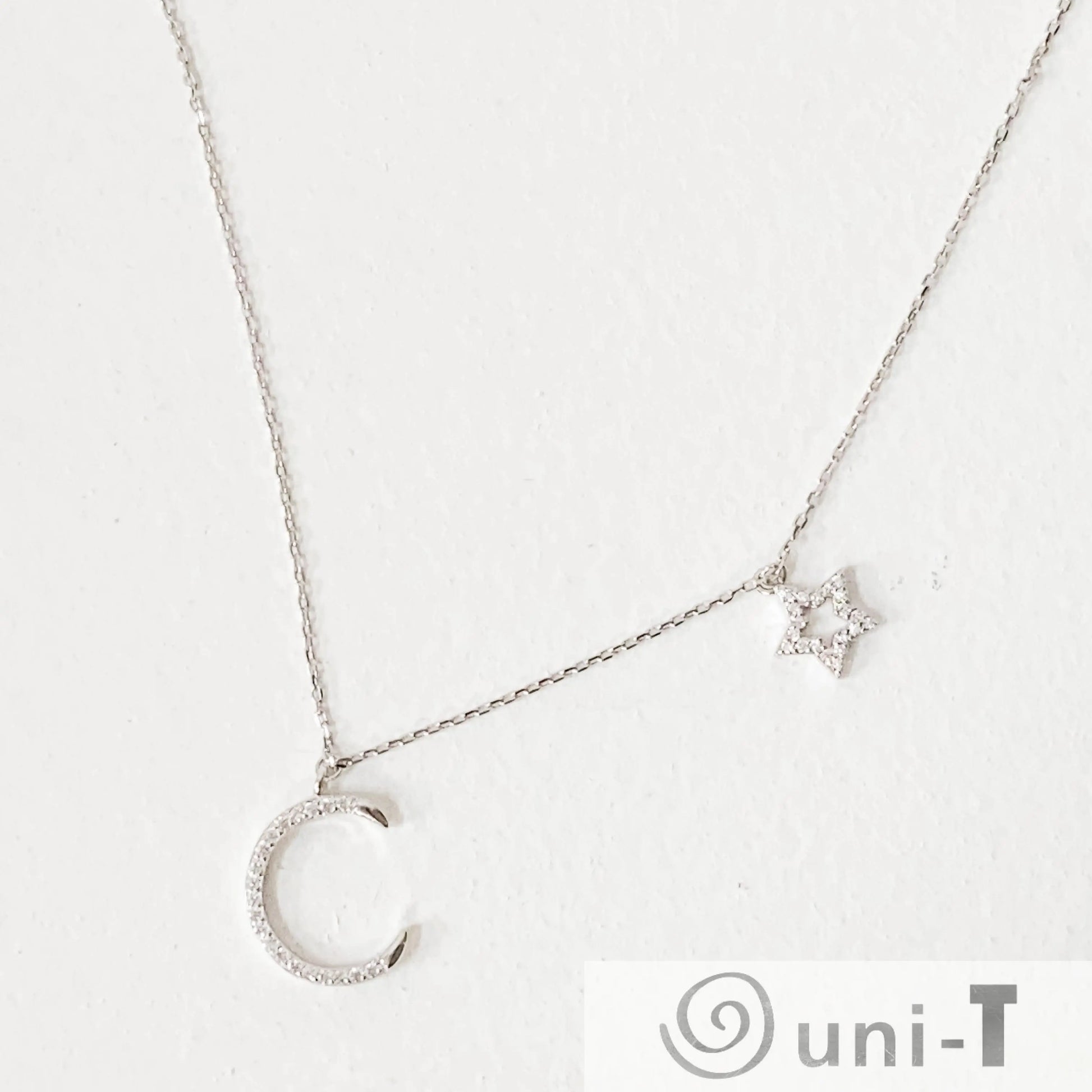 Dainty Pave Star and the Moon Necklace Janine Gerade