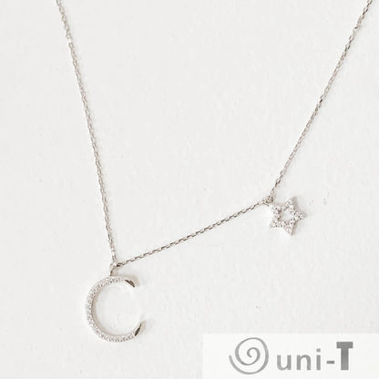 Dainty Pave Star and the Moon Necklace Janine Gerade