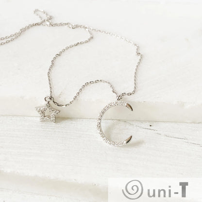 Dainty Pave Star and the Moon Necklace Janine Gerade