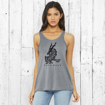 Dragon Flowy Tank Top Women in heather gray with bold dragon graphic and 'dare more' text. Empower your style with fearless fashion.