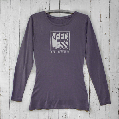 Dark purple women's bamboo and organic cotton long sleeve shirt with 'Need Less Do More' design. Eco-friendly minimalist apparel by Uni-T.