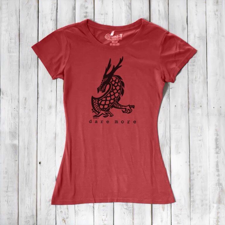 Red 'Dare More' women's dragon T-shirt with bold black graphic. Eco-conscious bamboo-organic cotton fantasy tee by Uni-T.