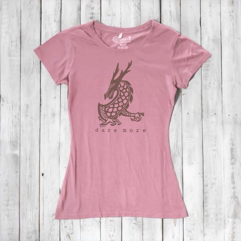 Pink 'Dare More' dragon T-shirt for women with brown fantasy print. Soft bamboo-organic cotton blend tee by Uni-T.