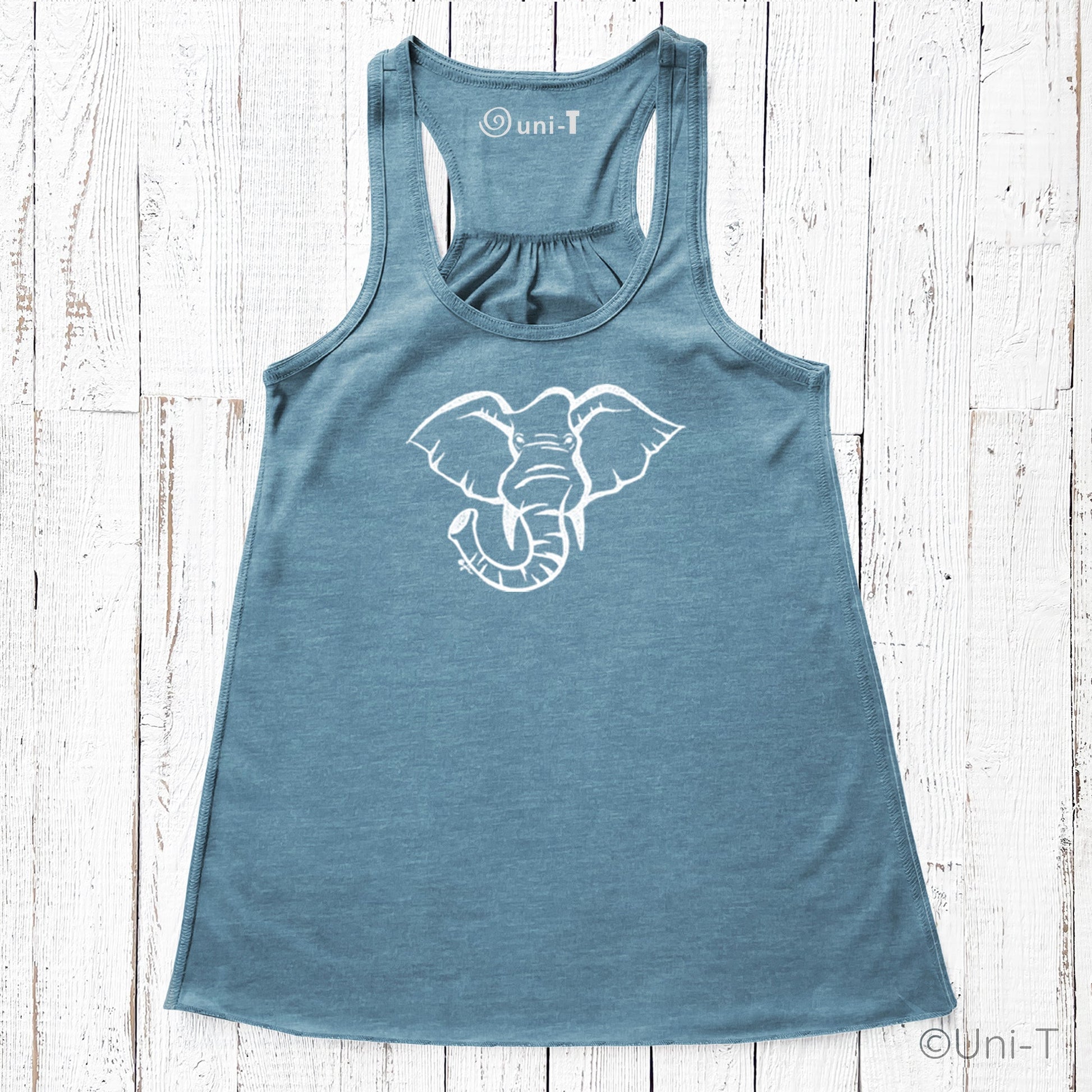 Blue elephant tank top for women with white ink design. Eco-friendly racerback top promoting elephant and wildlife conservation.