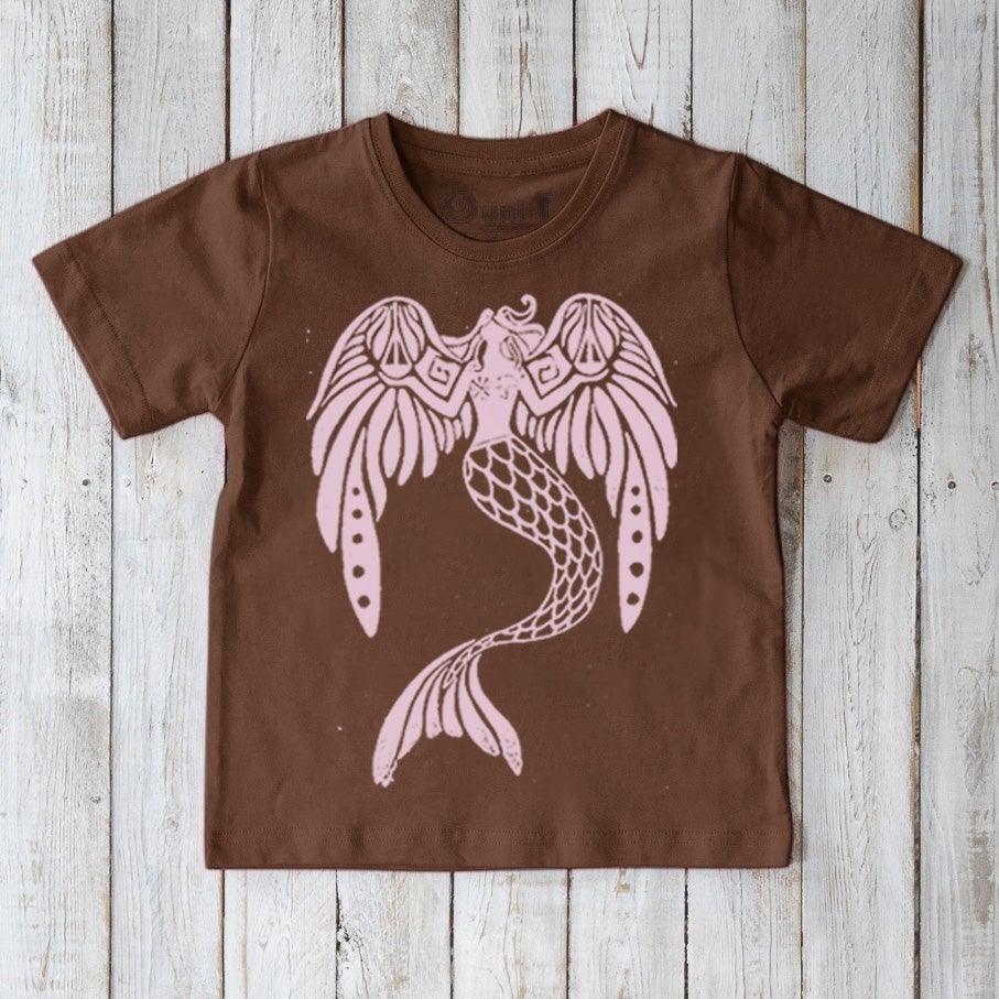 Brown Kids' Organic Cotton T-Shirt with pale pink mermaid fantasy print. Uni-T sustainable apparel featuring 'The Magnificent' ocean creature design.
