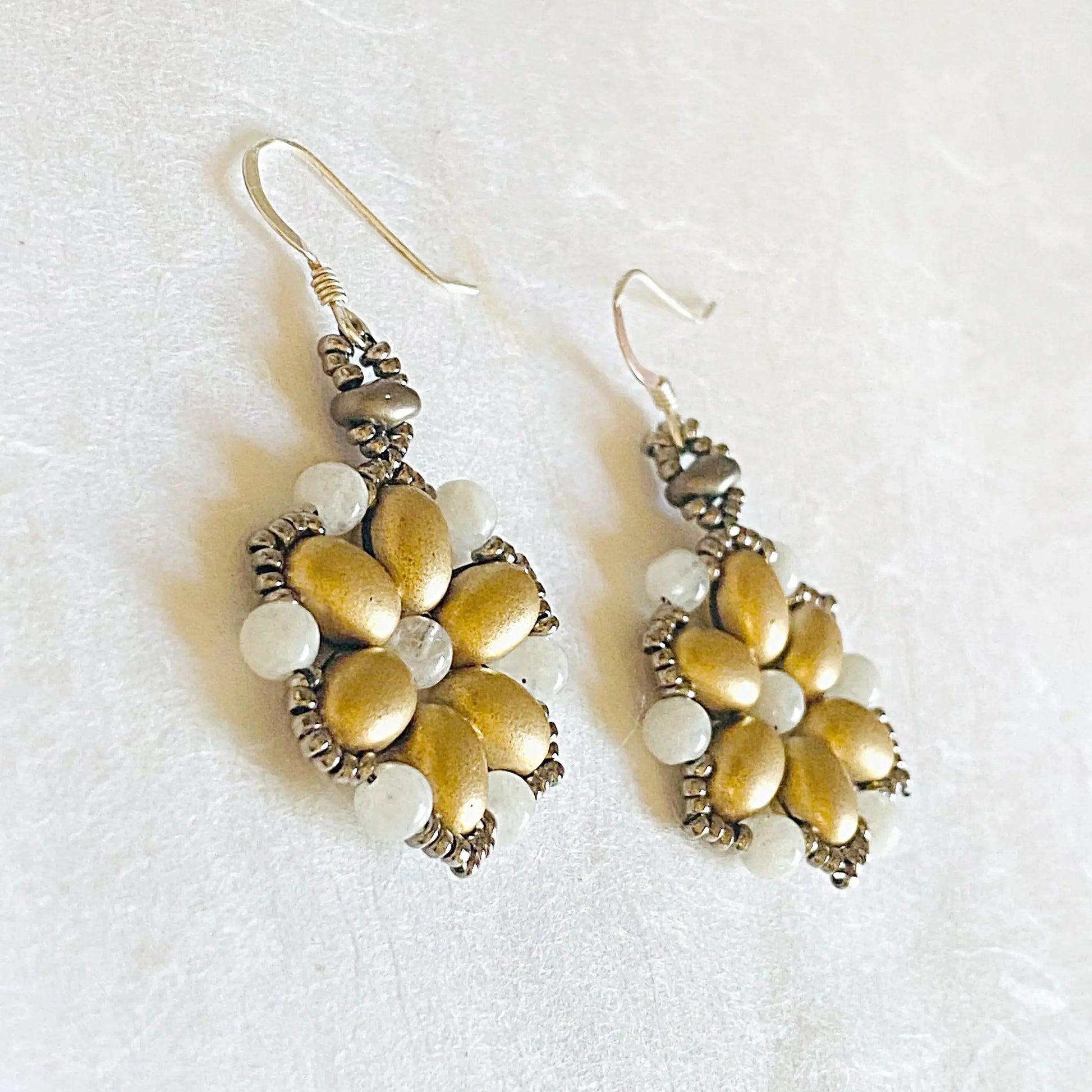 Gold Medallion Earrings with flower design featuring moonstone beads and frosted gold drops. Elegant dangle earrings with sterling silver wires.