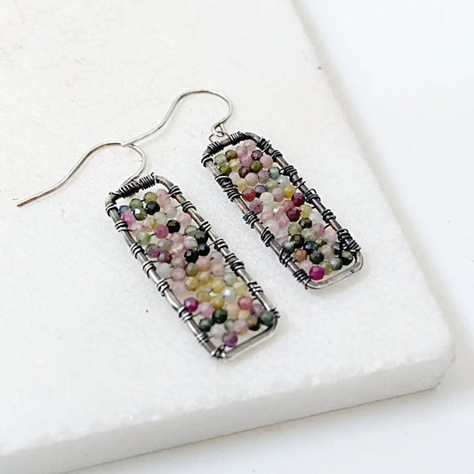 Sterling silver gemstone bar earrings featuring 2mm tourmaline beads in a rectangle shape. Elegant handcrafted jewelry with a wire-wrapped finish.