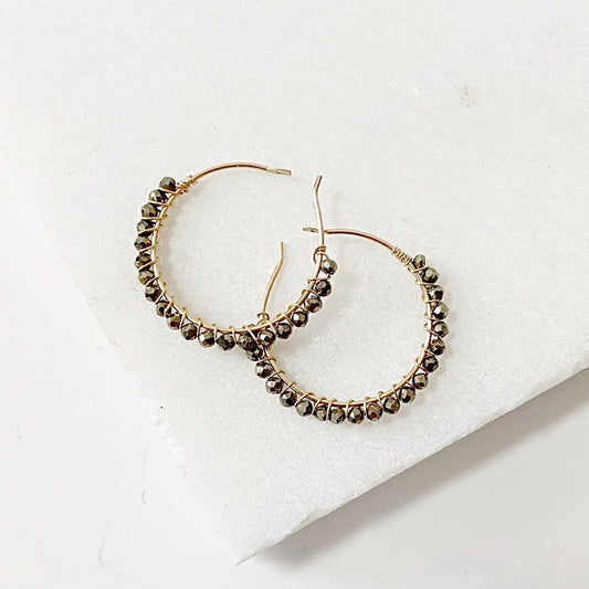Gold filled gemstone hoop earrings with wire wrapped pyrite beads in a 1-inch circle design, handcrafted for elegant everyday wear.