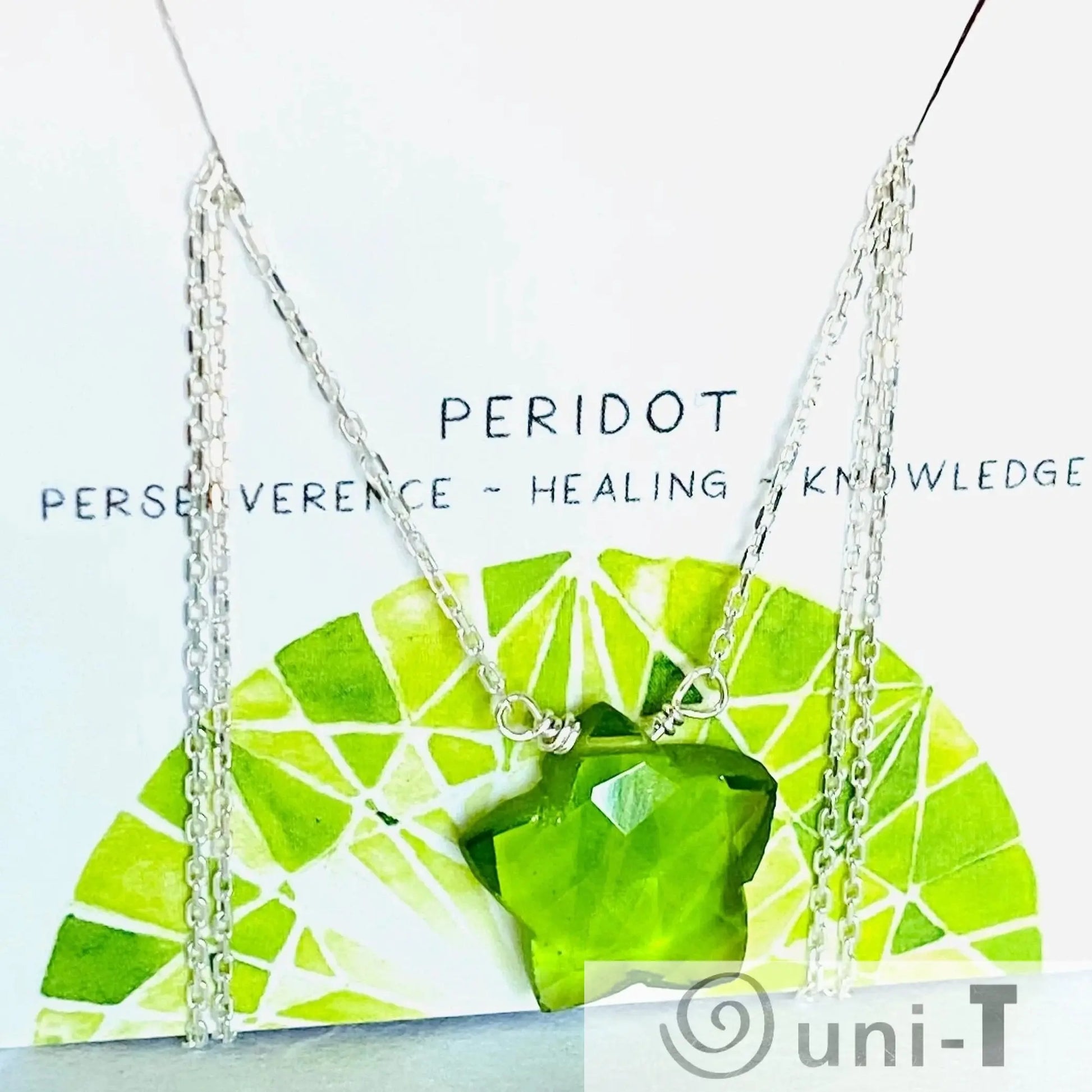 Gemstone Star Necklace - Buy Now | Genuine Gemstone Jewelry showcasing a vibrant peridot star pendant on a sterling silver chain, representing healing and knowledge.