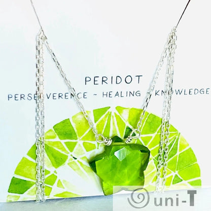 Gemstone Star Necklace - Buy Now | Genuine Gemstone Jewelry showcasing a vibrant peridot star pendant on a sterling silver chain, representing healing and knowledge.