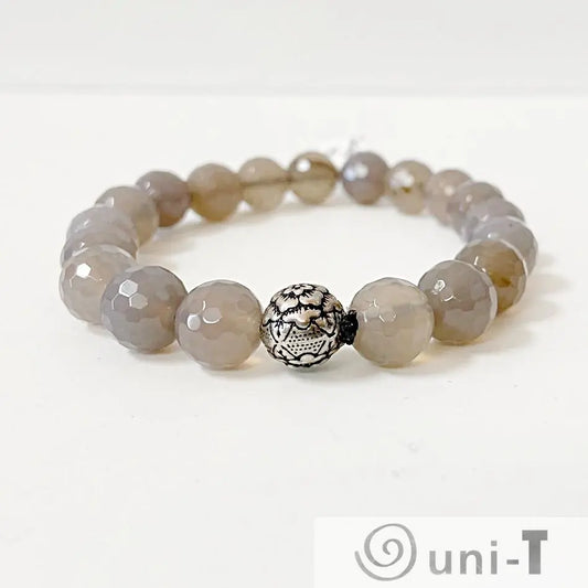 Gemstone Stretch Bracelet - Agate Gemstone | Fits Most Wrists. Features faceted grey agate beads with a detailed silver accent bead.