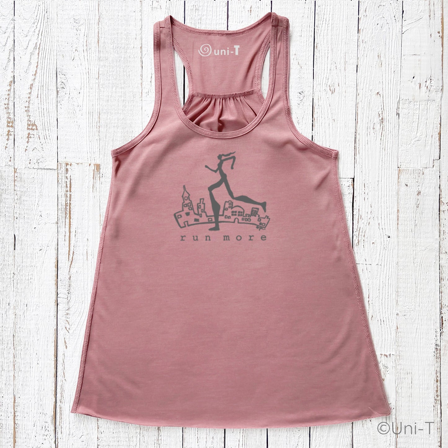 Pink Run More Tank Top for Women with dark runner and city illustration, stylish and motivational activewear for women runners.