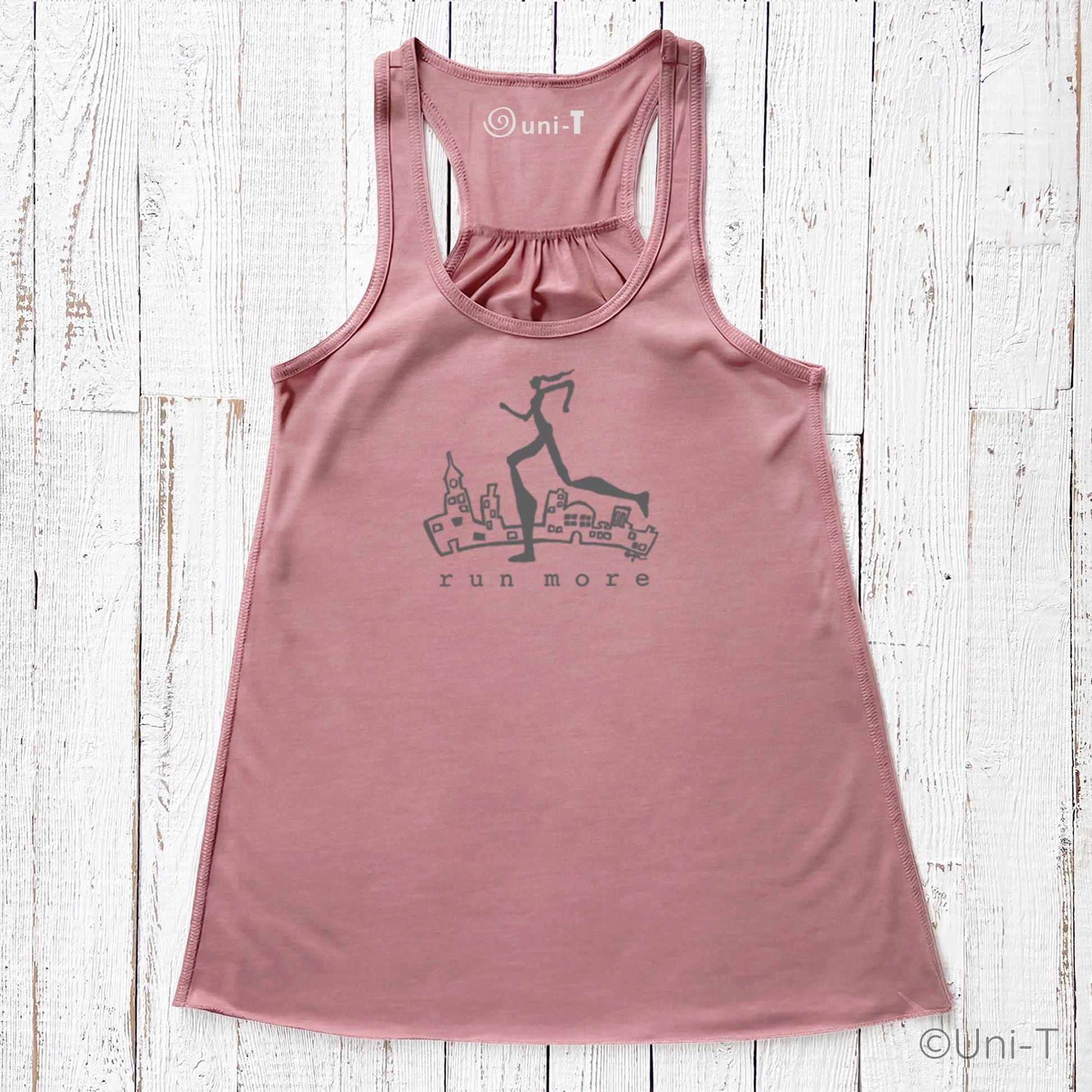 Pink Run More Tank Top for Women with dark runner and city illustration, stylish and motivational activewear for women runners.