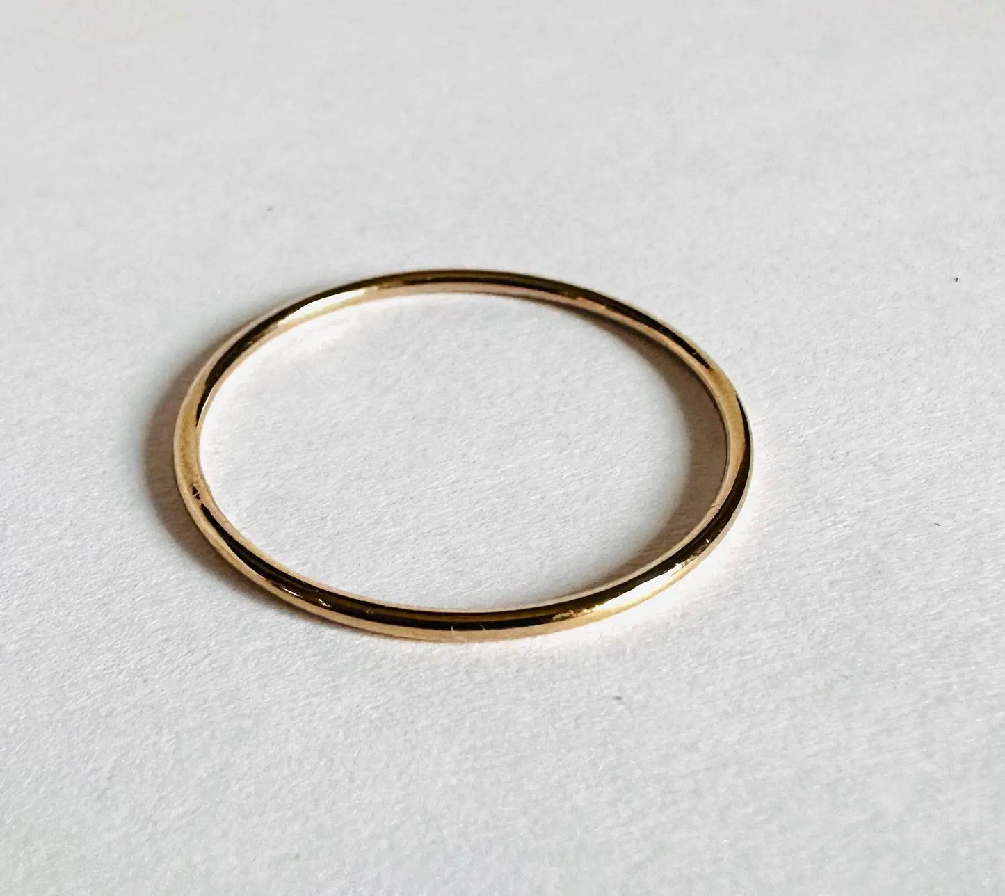Plain gold filled stacking ring with a smooth polished finish, ideal for minimalist and everyday jewelry styling.