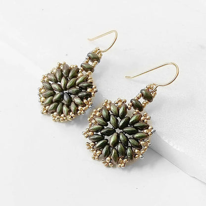 Handcrafted green flower medallion earrings with gold accents and amethyst bead details. Stylish silver accessory for elegant looks.