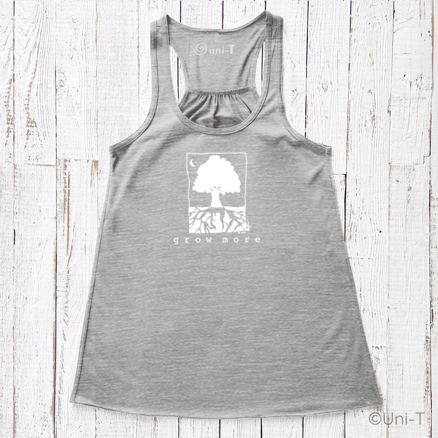 "Grow More" flowy tank top in heather grey featuring tree and roots design, soft poly-viscose blend for sustainable fashion lovers.