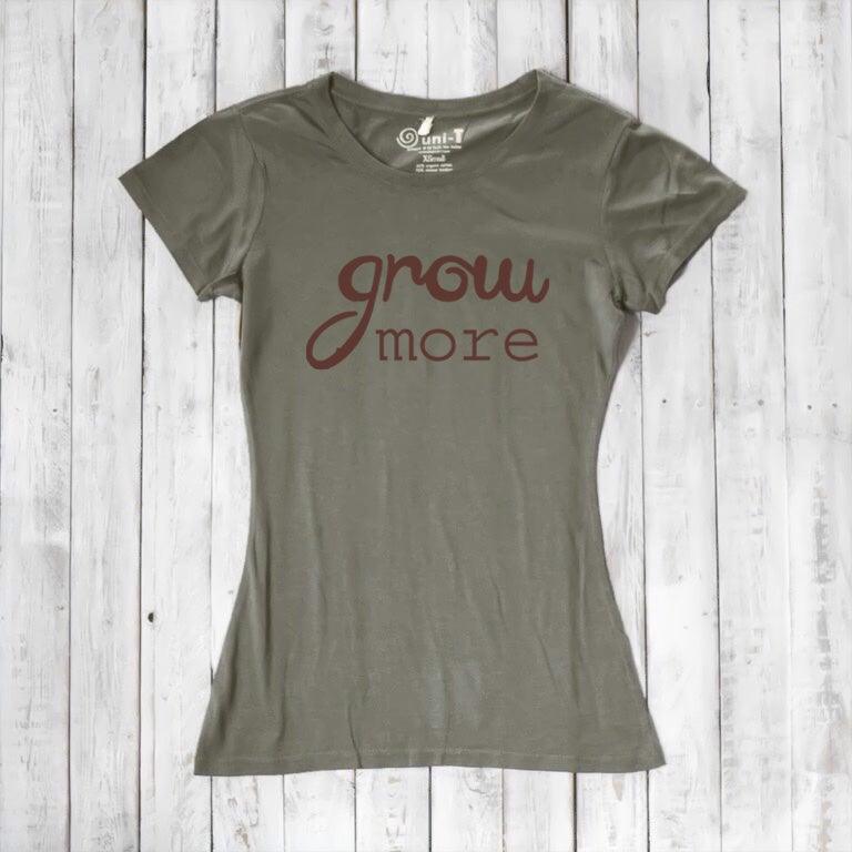 Women's Gardening T-Shirt in Bamboo & Organic Cotton with 'Grow More' quote in brown on olive green. Eco-friendly gift for plant lovers.