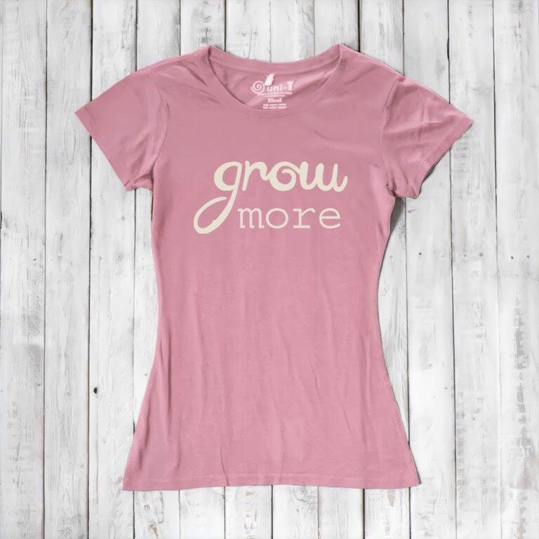 Women's Bamboo & Organic Cotton T-Shirt in rustic pink with cream 'Grow More' typography. Sustainable gardening-themed apparel by Uni-T.