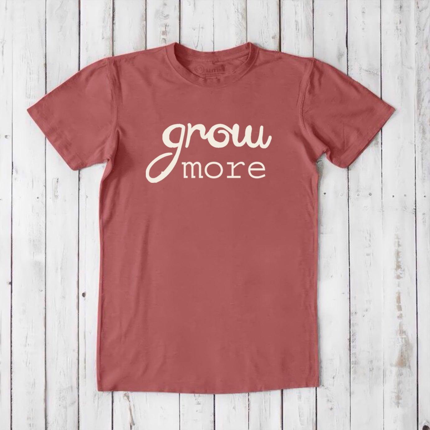 Rust red 'Grow More' men's bamboo and organic cotton T-shirt, classic fit graphic tee for gardening and plant enthusiasts.