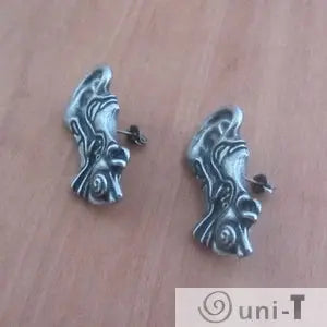 Side view of Human Ear Anatomy Earrings with visible post backs. Anatomically inspired ear jewelry with a bold, educational twist.