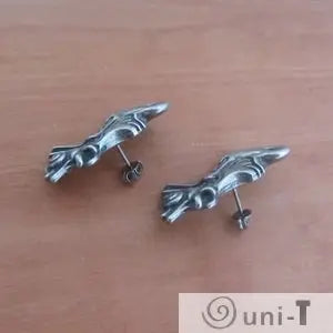 Angled view of Human Ear Anatomy Earrings showing depth and texture. Unique ear jewelry combining science and fashion.