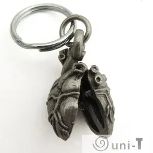 Split-open Anatomical Heart Keychain displaying internal heart structure, a creative twist on traditional heart lockets.
