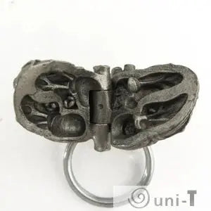 Fully open Human Heart Anatomy Keychain with intricate internal sculpting, great for medical professionals and gift shops.