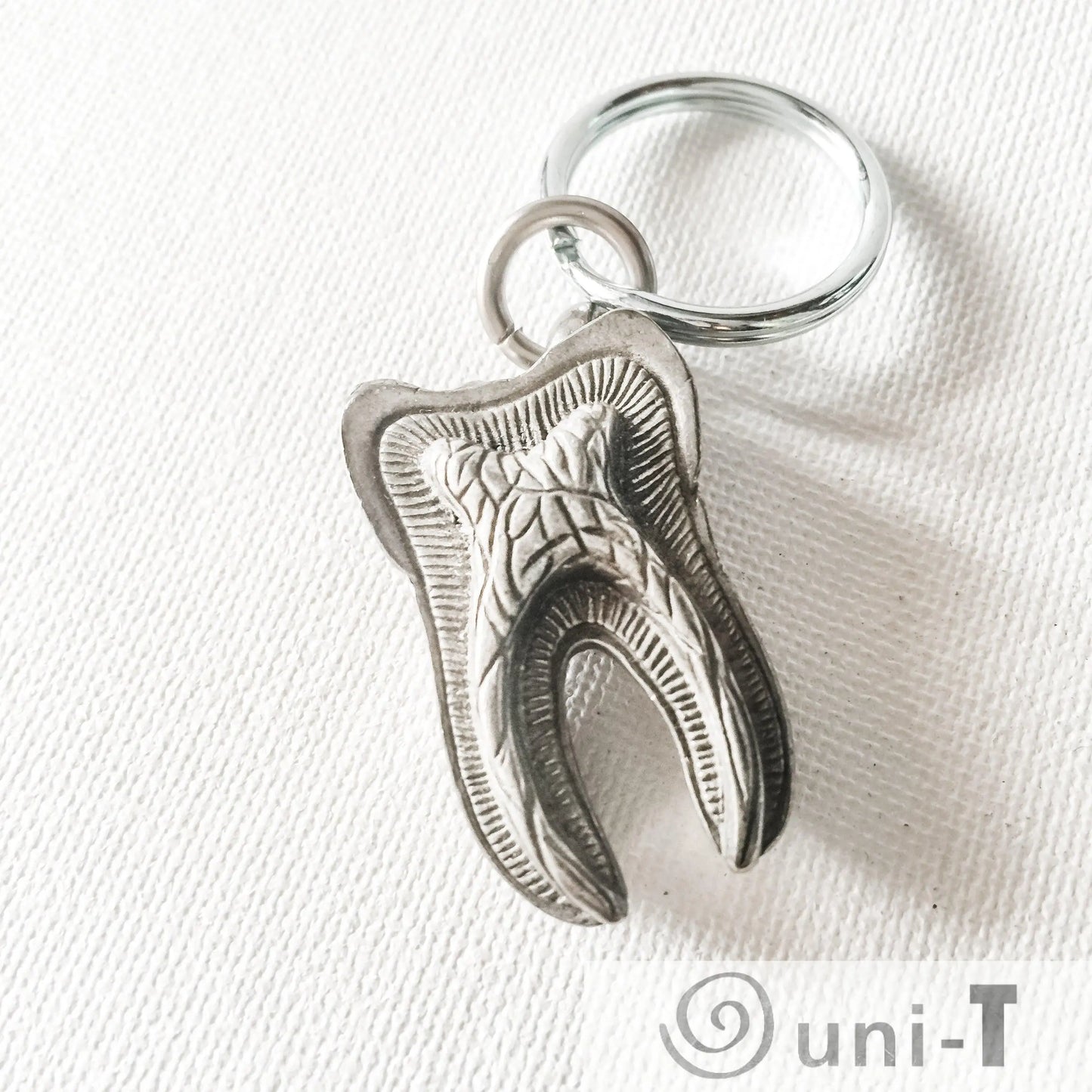 Human Tooth Keychain - Anatomical Human Molar Keychain in pewter with detailed root structure, ideal dental gift for professionals or students.
