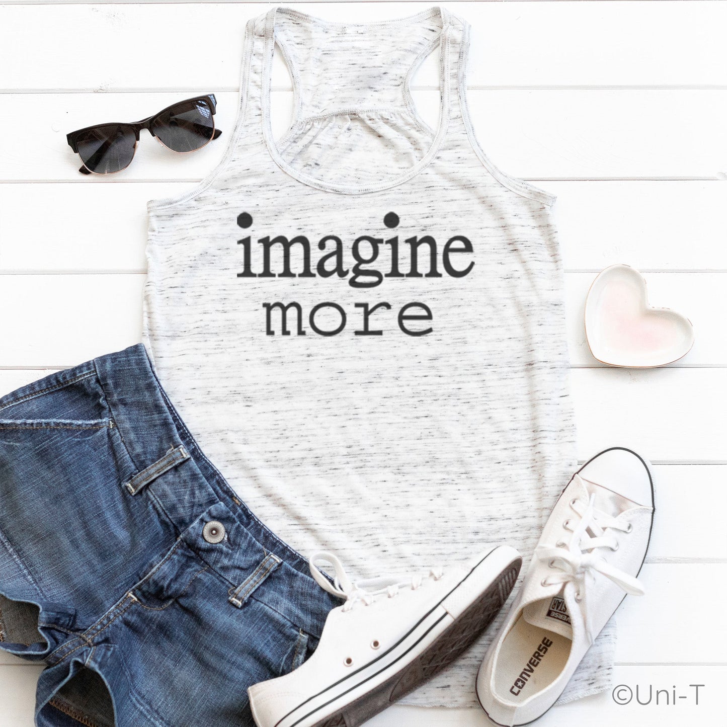 Women’s Flowy Tank Top - Imagine More in heather white styled with denim shorts, sunglasses, and sneakers. Lightweight inspirational summer wear.