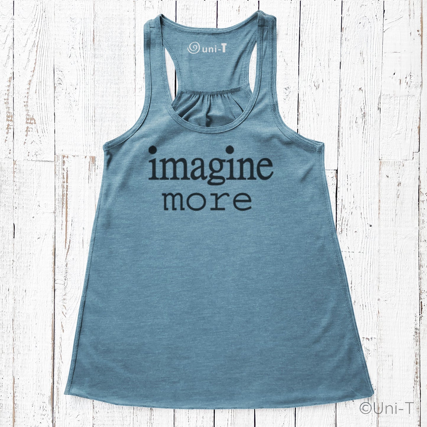 Women’s Flowy Tank Top - Imagine More in denim blue with black text. Visionary comfort top perfect for inspirational everyday outfits.