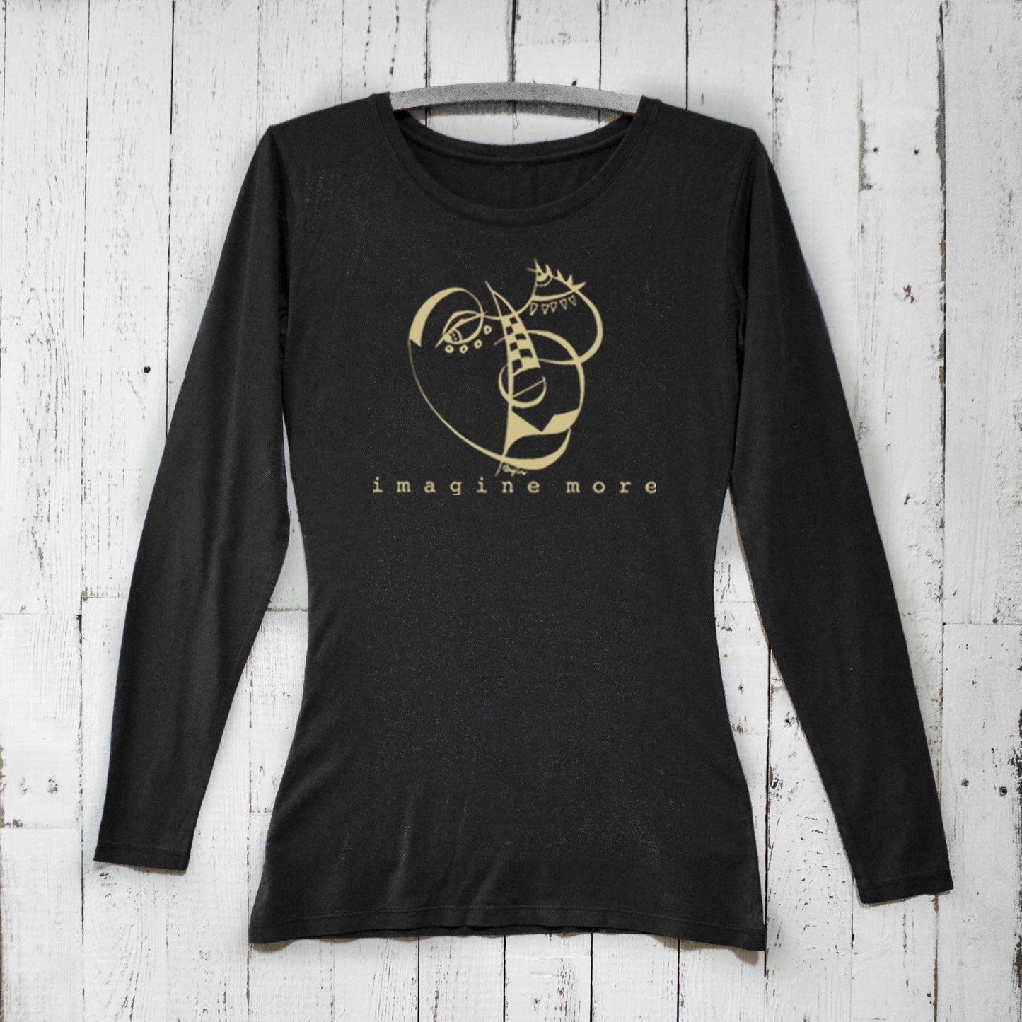 Women's Cubism Face Long Sleeve T-Shirt in black bamboo & organic cotton with 'Imagine More' graphic. Artistic cozy tee, ideal gift for creatives.