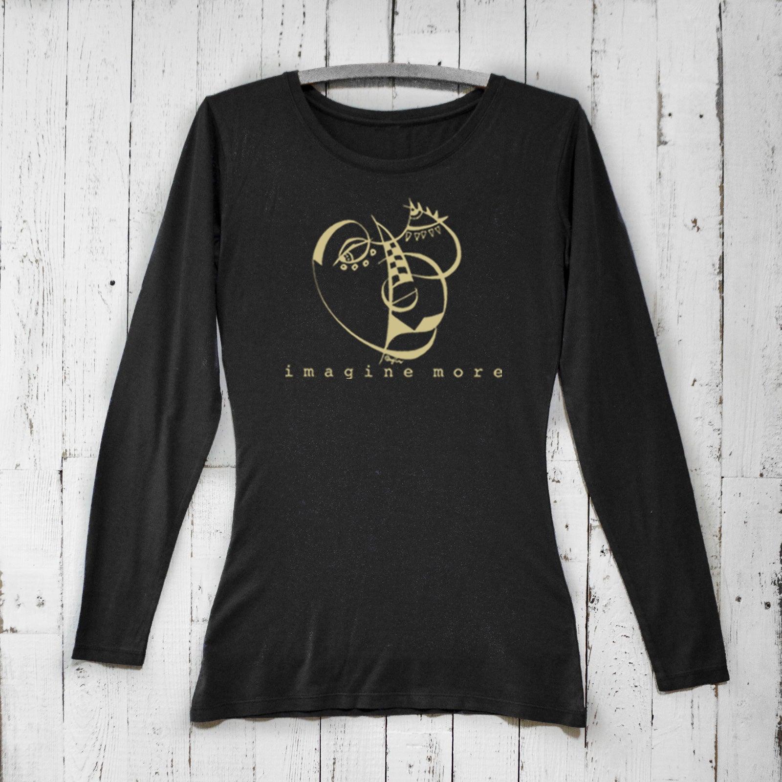 Women's Cubism Face Long Sleeve T-Shirt in black bamboo & organic cotton with 'Imagine More' graphic. Artistic cozy tee, ideal gift for creatives.