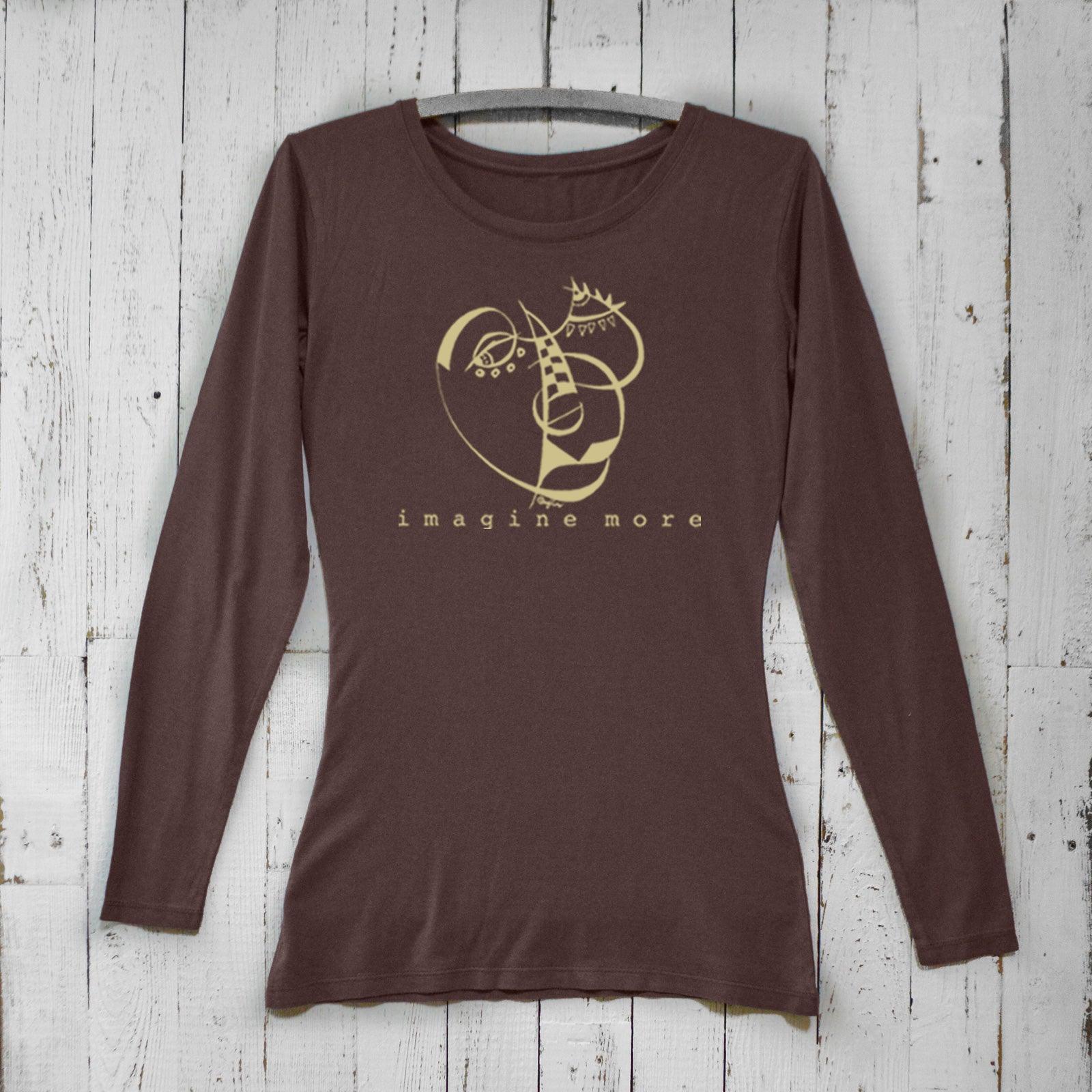 Brown Women's Cubism Face Long Sleeve T-Shirt in bamboo & organic cotton. Features abstract cubist face and 'Imagine More' slogan for art lovers.