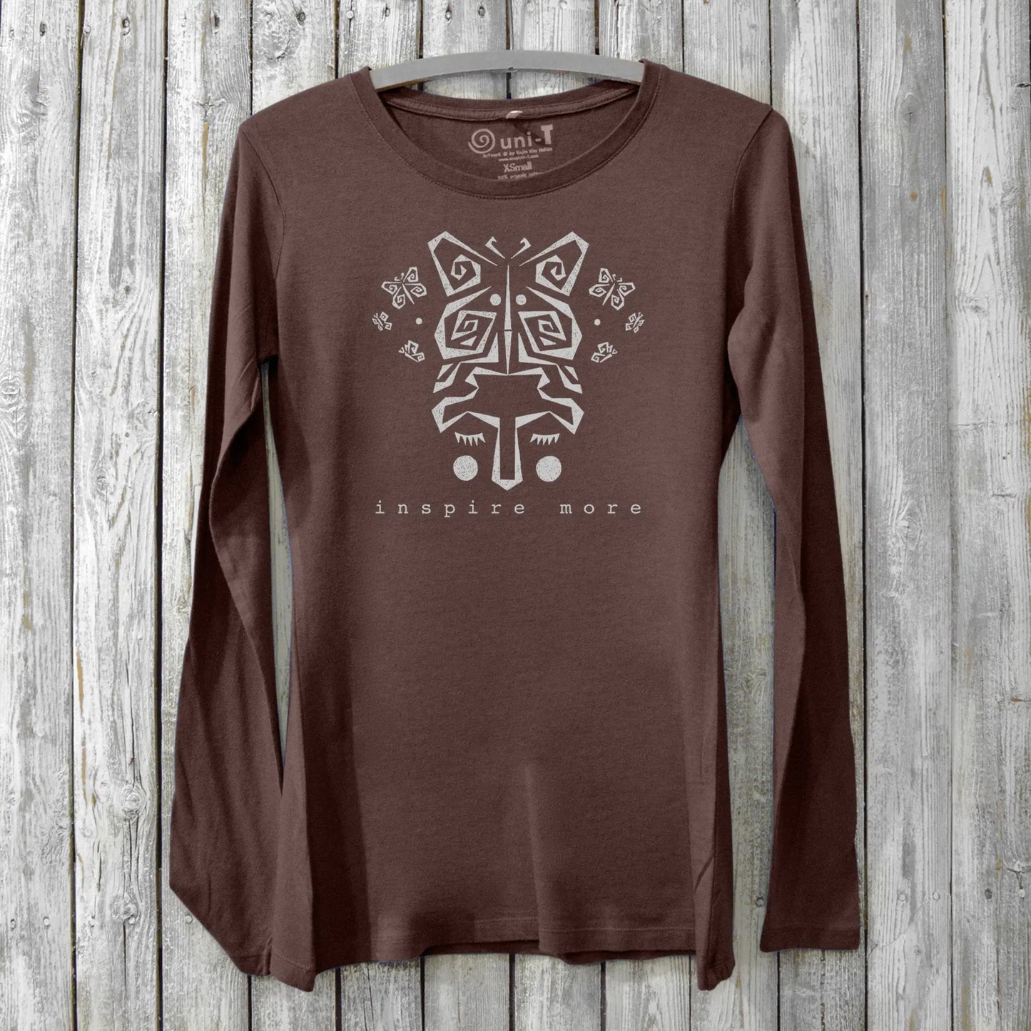 Brown women's long sleeve graphic tee with butterfly and 'Inspire More' text. Made from soft bamboo & organic cotton, perfect for mindful gifting.