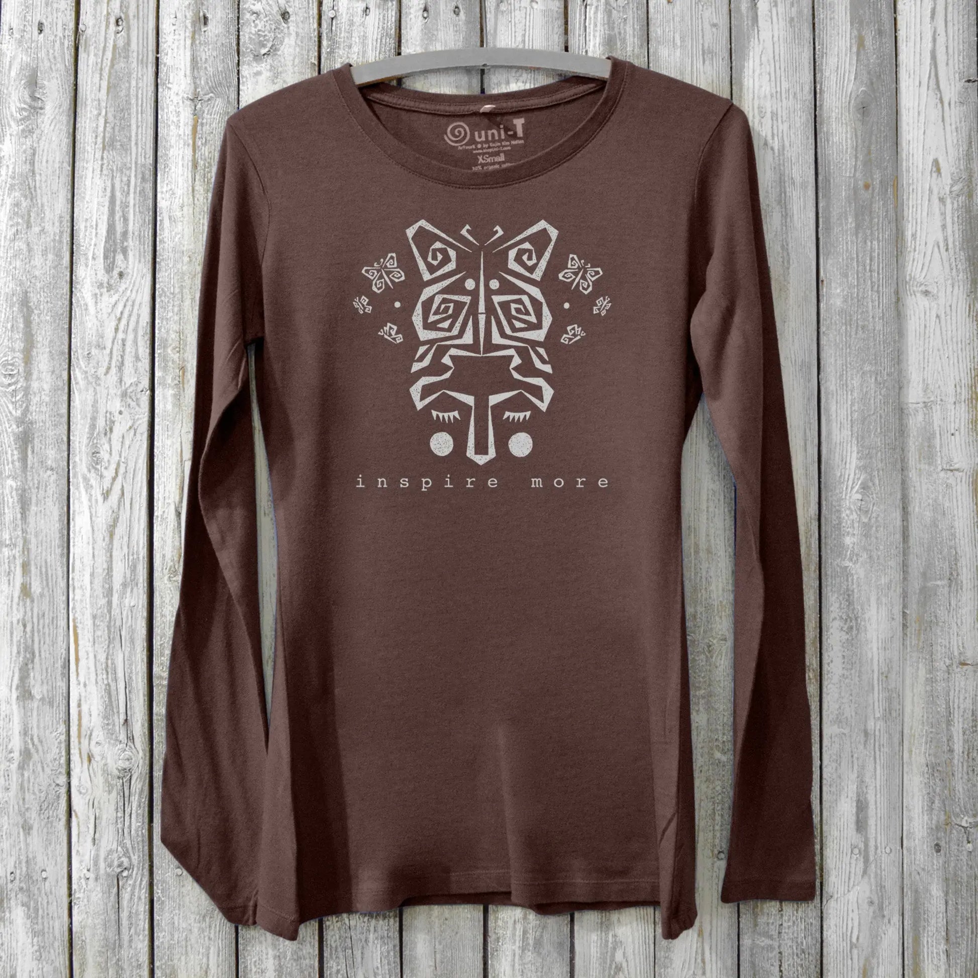Brown women's long sleeve graphic tee with butterfly and 'Inspire More' text. Made from soft bamboo & organic cotton, perfect for mindful gifting.