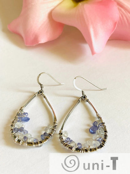 Elegant Iolite and Moonstone Earrings in teardrop form, wire wrapped in sterling silver. Perfect gemstone accessory for gifting.