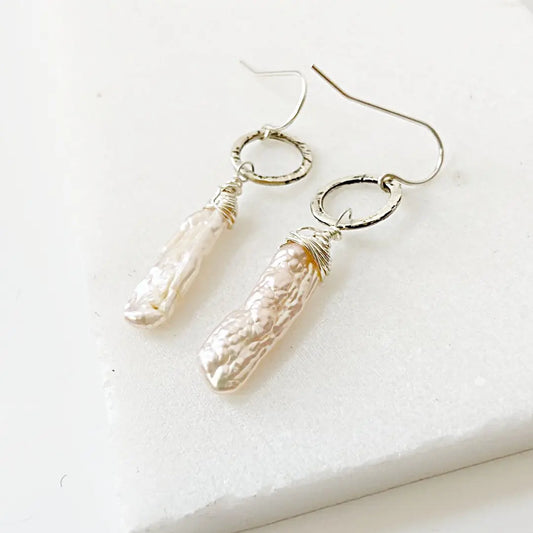 Freshwater Keshi Pearl Circle Earrings featuring unique baroque pearls and hammered silver hoops. Lightweight and perfect for everyday elegance.