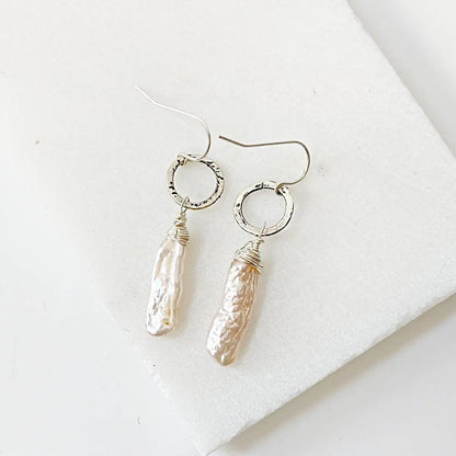 Sterling silver Keshi Pearl Earrings with organic-shaped freshwater pearls and artisan-style circle accents. Ideal for gifting or special occasions.