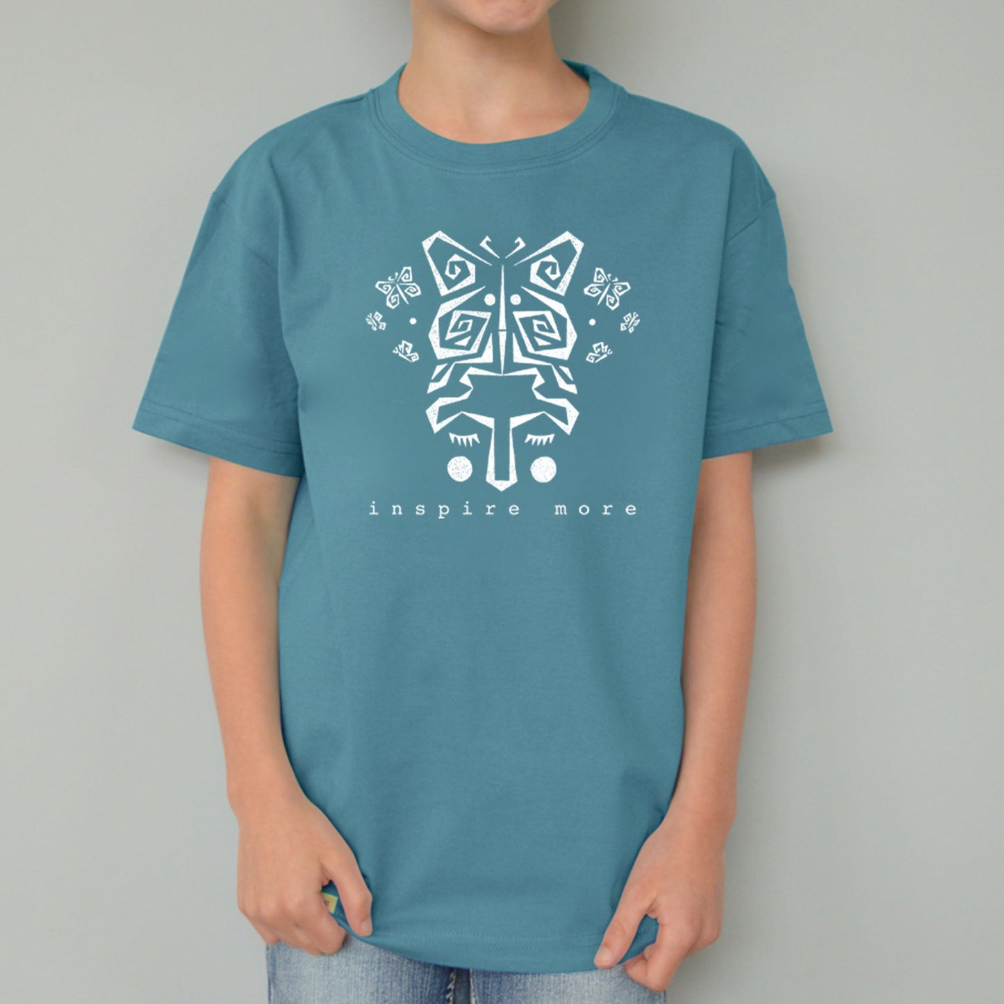Kids' cute butterfly t-shirt in teal organic cotton with 'Inspire More' graphic by Uni-T. Eco-friendly nature-inspired sustainable top.