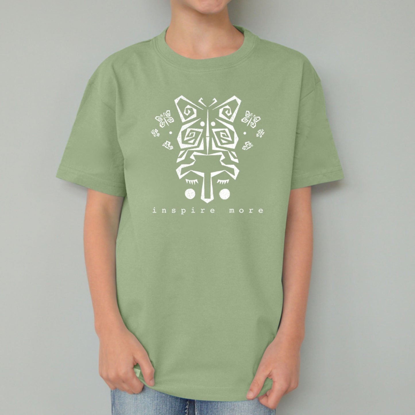 Green kids' organic cotton t-shirt with white butterfly design and 'Inspire More' slogan. Eco-conscious Uni-T nature-themed graphic top.