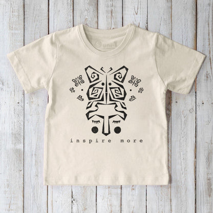 Cream kids' organic cotton t-shirt with black butterfly graphic and 'Inspire More' text. Eco-friendly Uni-T nature-inspired sustainable top.