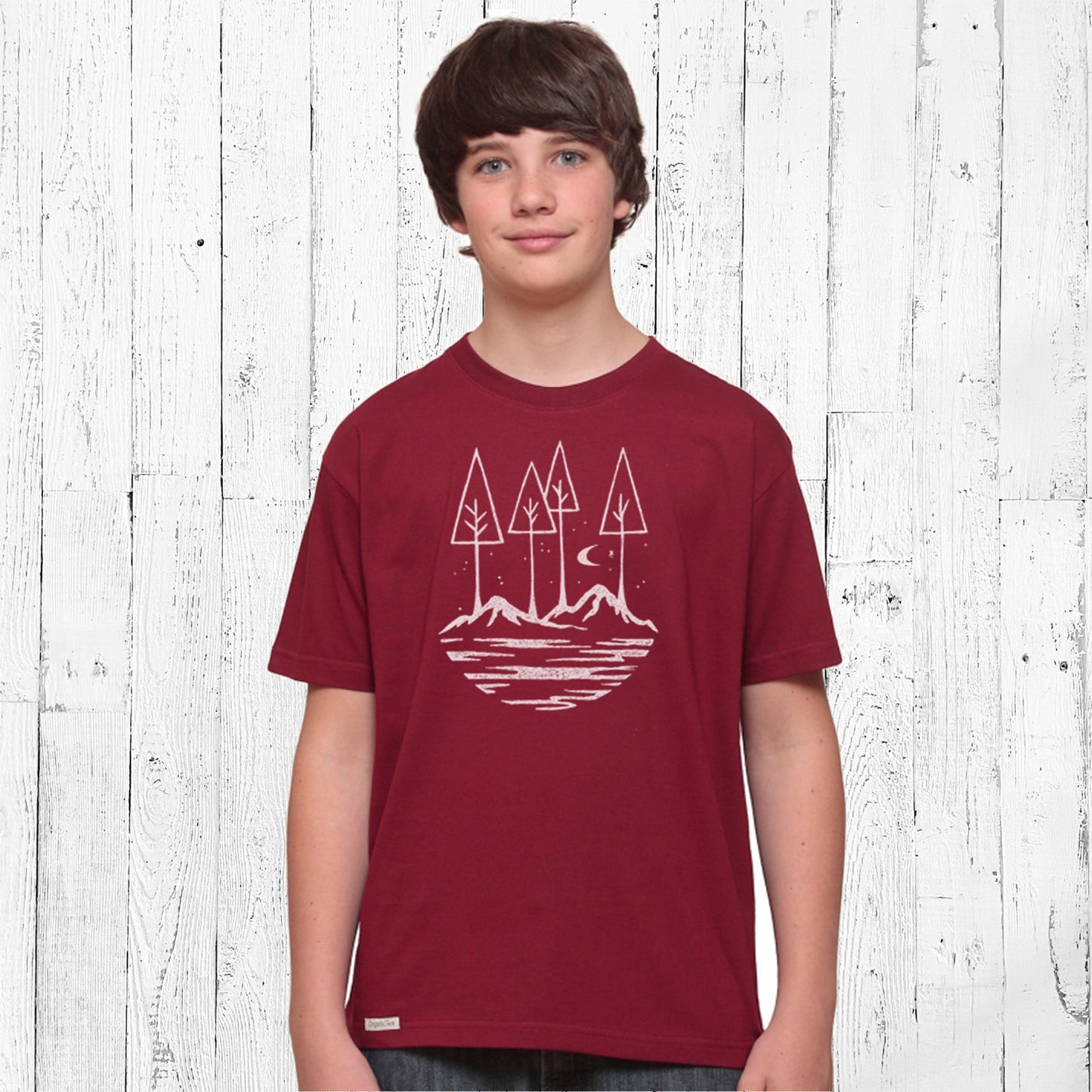 Inspirational Kids' Organic Cotton Nature T-Shirt in maroon, featuring minimalist forest and mountain design, ideal for school or play.