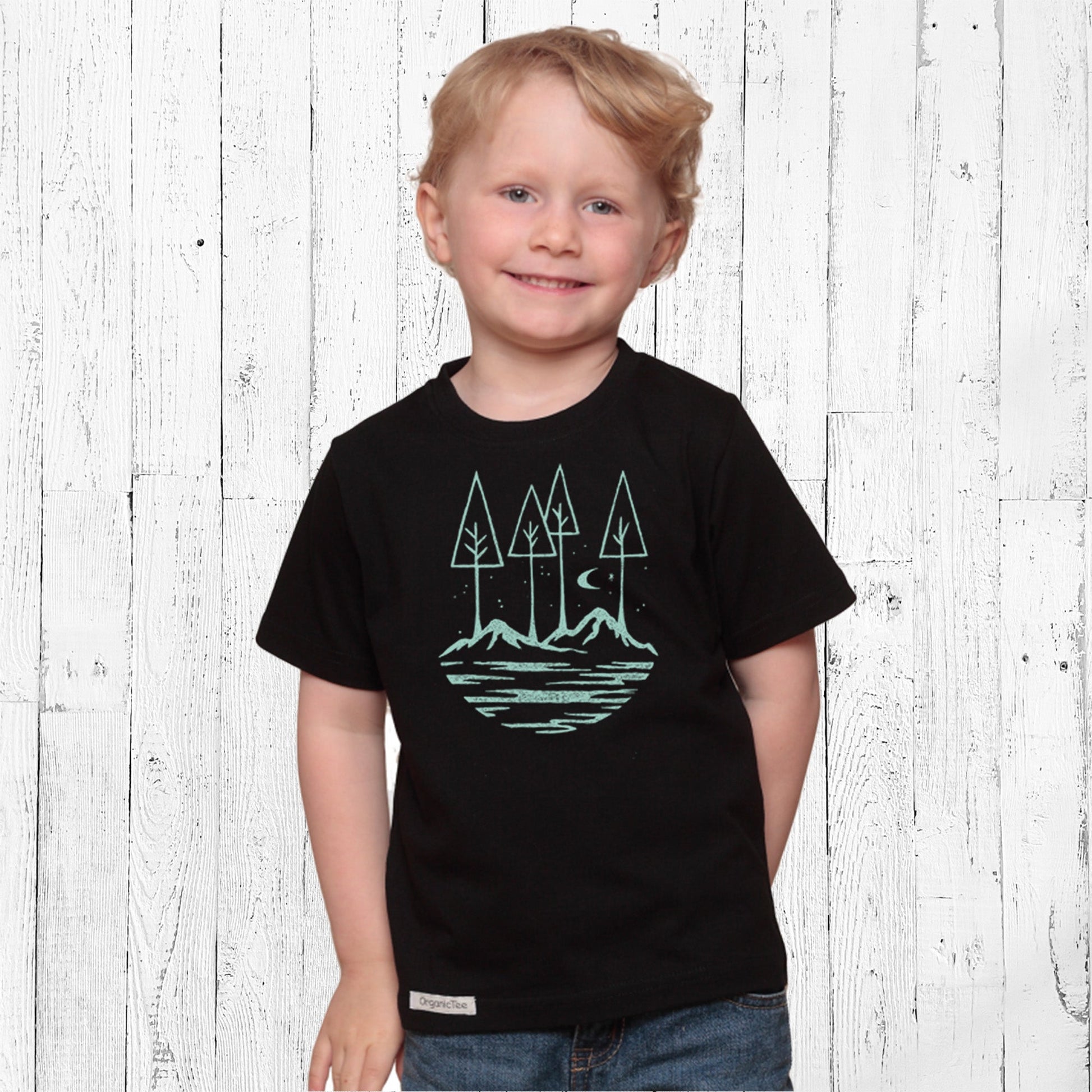 Black Kids' Organic Cotton Nature T-Shirt with calming forest and mountain graphic, a positive vibes tee for boys and girls.
