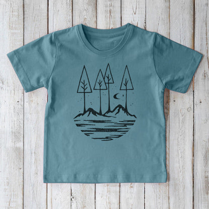 Soft blue Kids' Nature T-Shirt in 100% organic cotton, featuring a peaceful mountain and tree design, perfect for eco-conscious families.