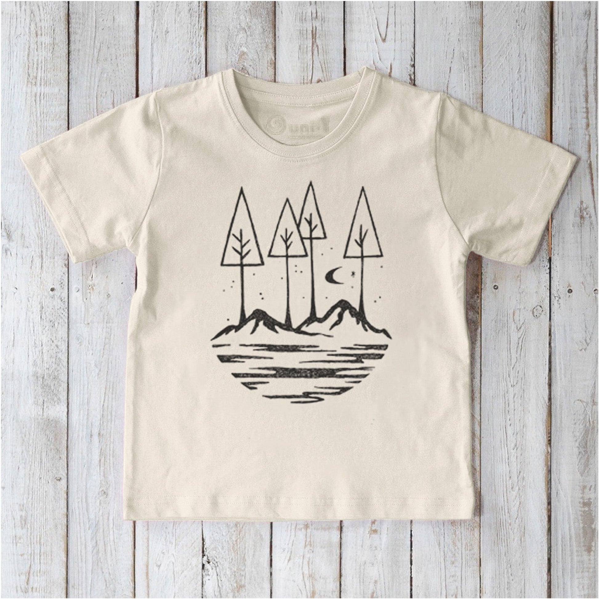 Natural cream Kids' Nature T-Shirt in organic cotton with minimalist mountain and tree artwork, sustainable and stylish for everyday wear.